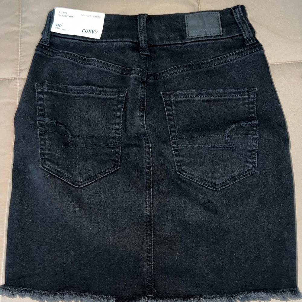 American Eagle black jean skirt. Size 00, 24W Regular. Curvy Hi-Rise Mini.